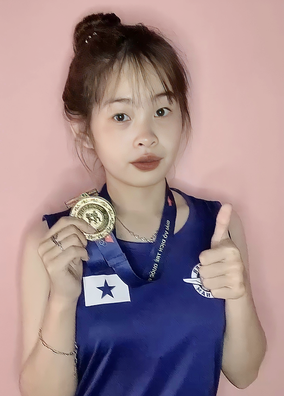 Cô gái giành huy chuong vàng kickboxing toàn qu?c trúng tuy?n vào ÐH Duy Tân nam 2022